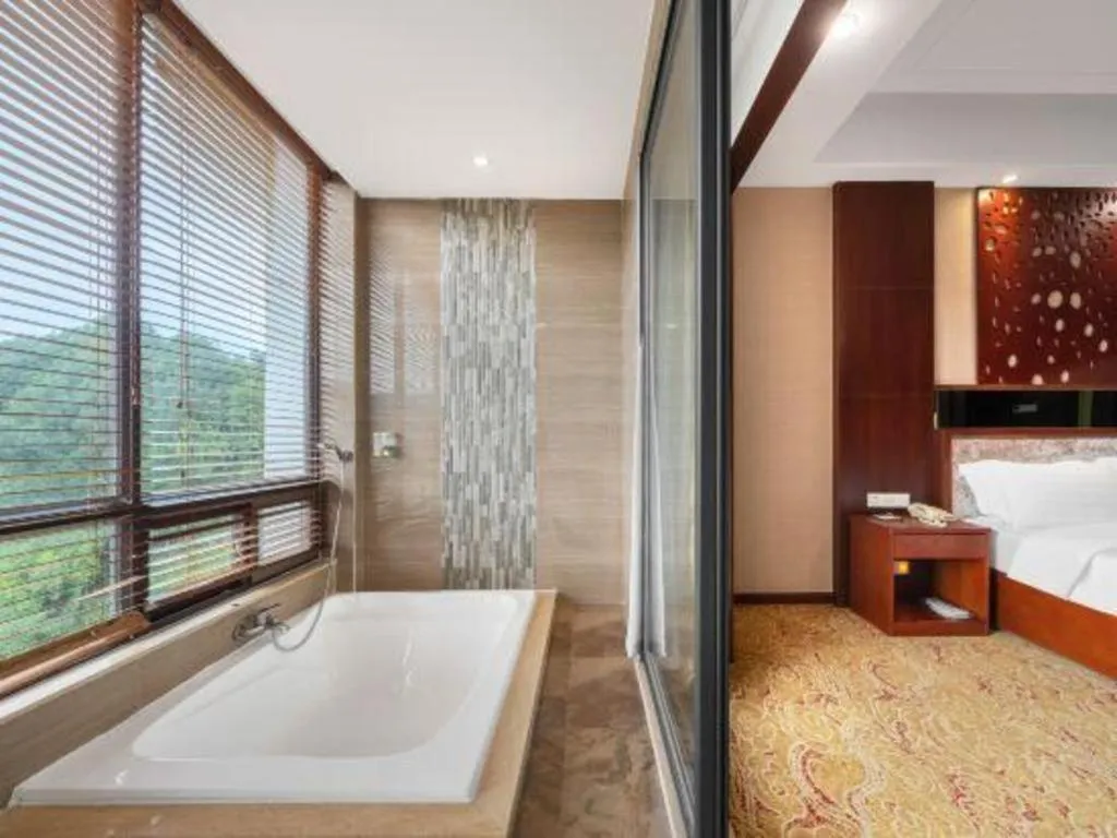 Bed in Longyan Capital International Hot Spring Resort