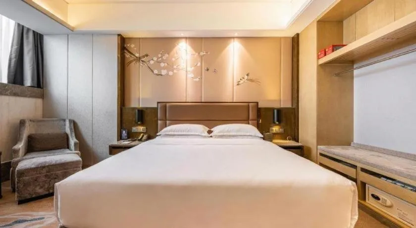 Bed in Licai Tianqi Hotel