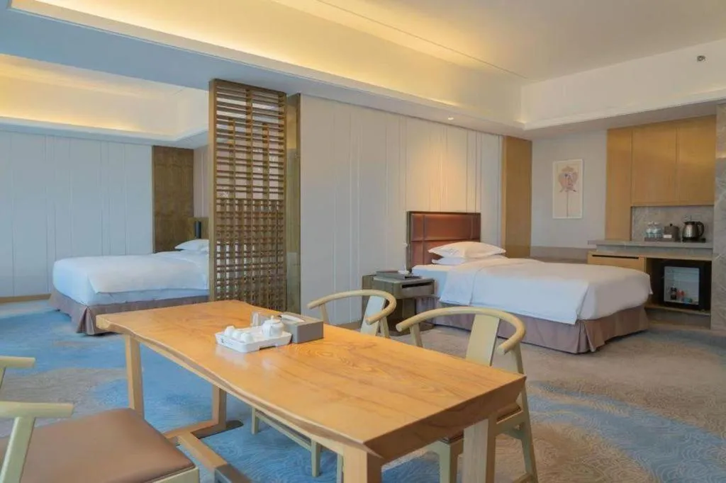 Bed in Licai Tianqi Hotel