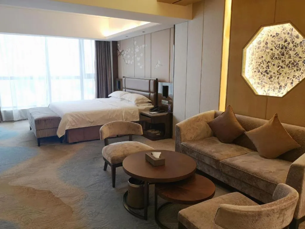 Bed in Licai Tianqi Hotel