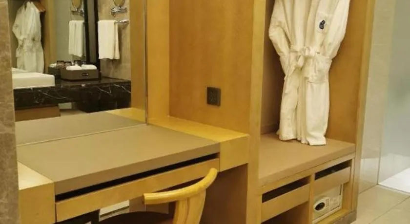 Bed in Licai Tianqi Hotel