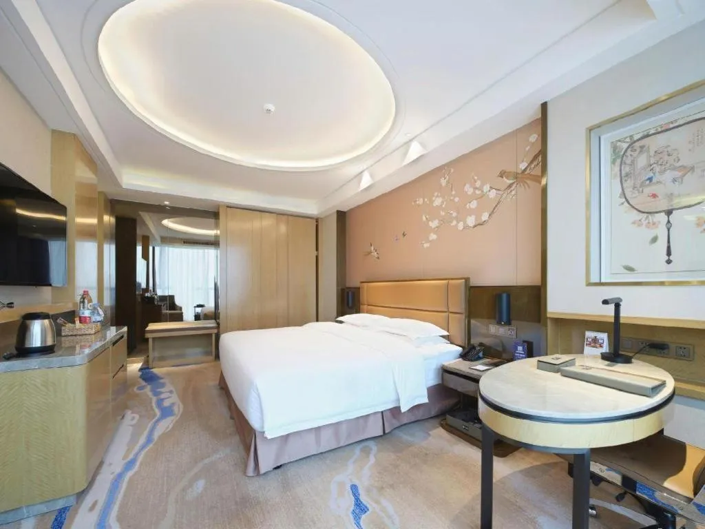 Bed in Licai Tianqi Hotel