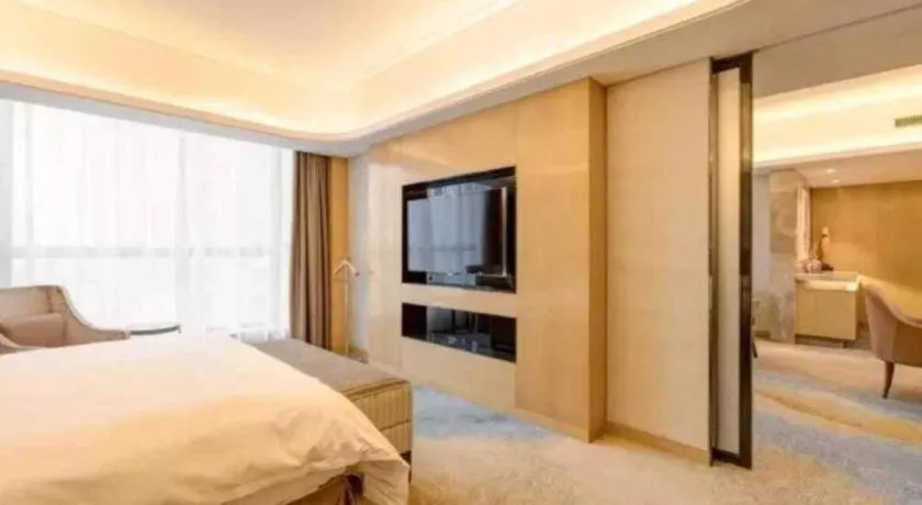 Bed in Licai Tianqi Hotel