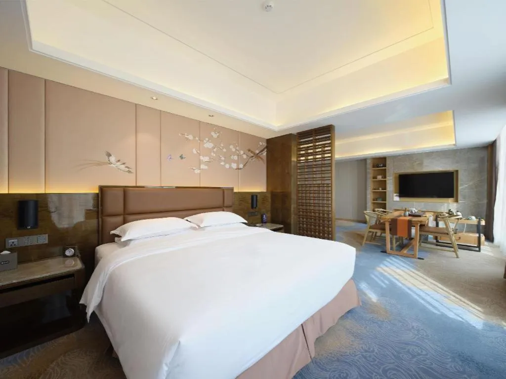 Bed in Licai Tianqi Hotel