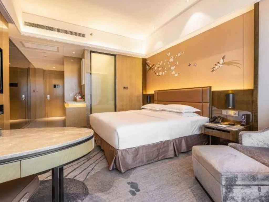 Bed in Licai Tianqi Hotel