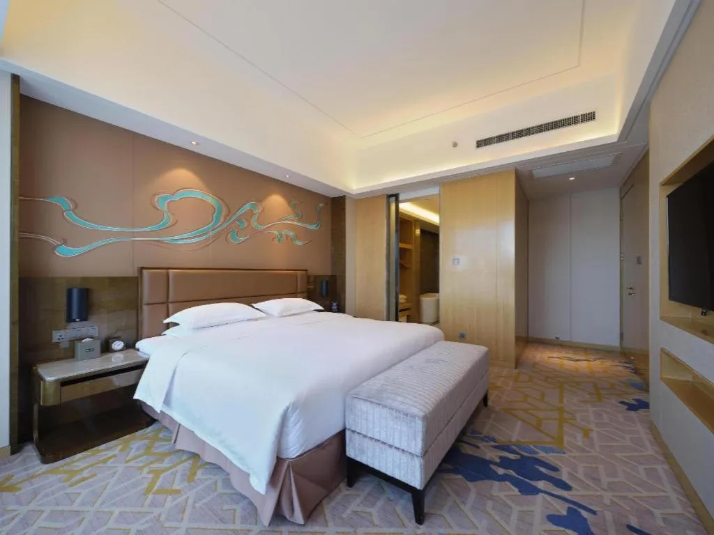 Bed in Licai Tianqi Hotel