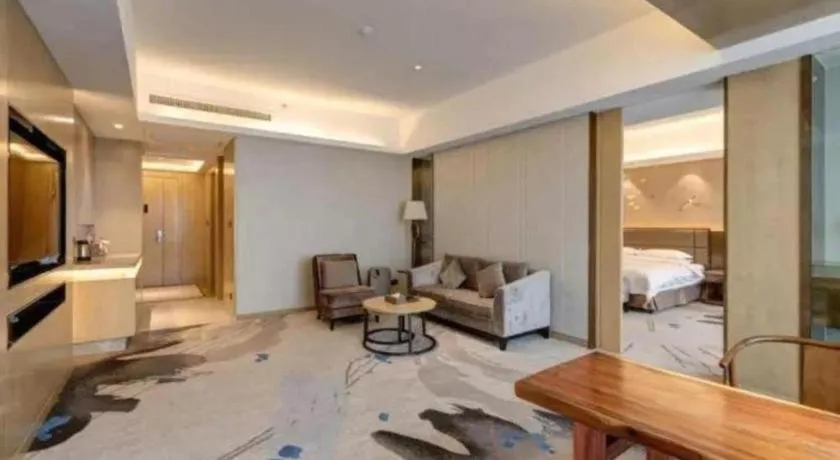 Bed in Licai Tianqi Hotel