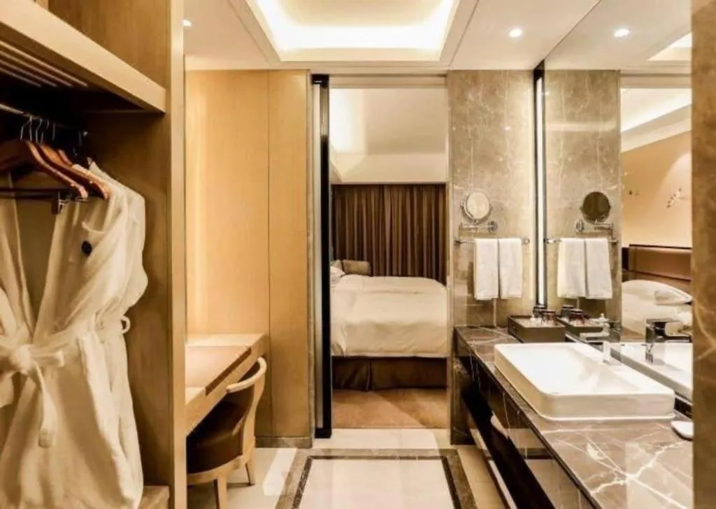 Bed in Licai Tianqi Hotel