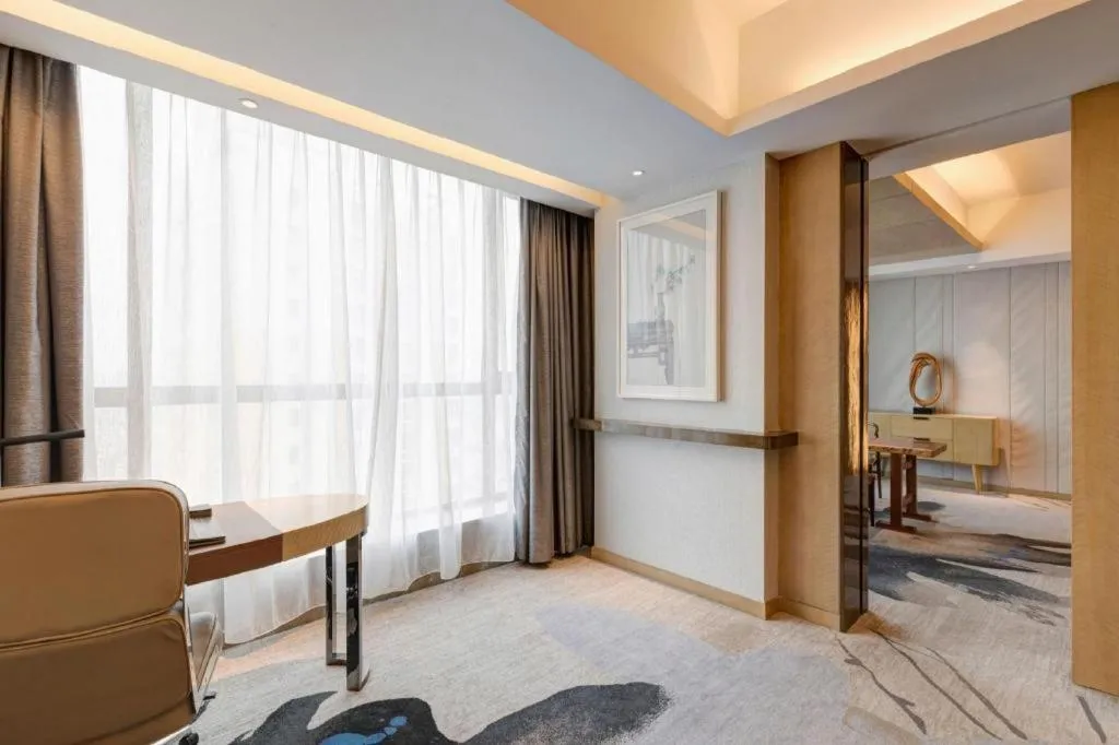 Bed in Licai Tianqi Hotel