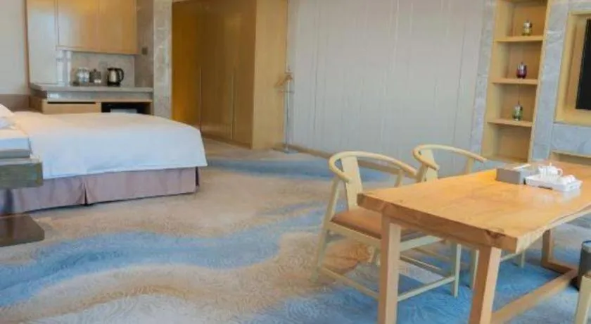 Bed in Licai Tianqi Hotel