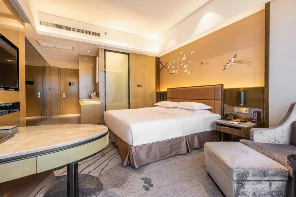 Bed in Licai Tianqi Hotel