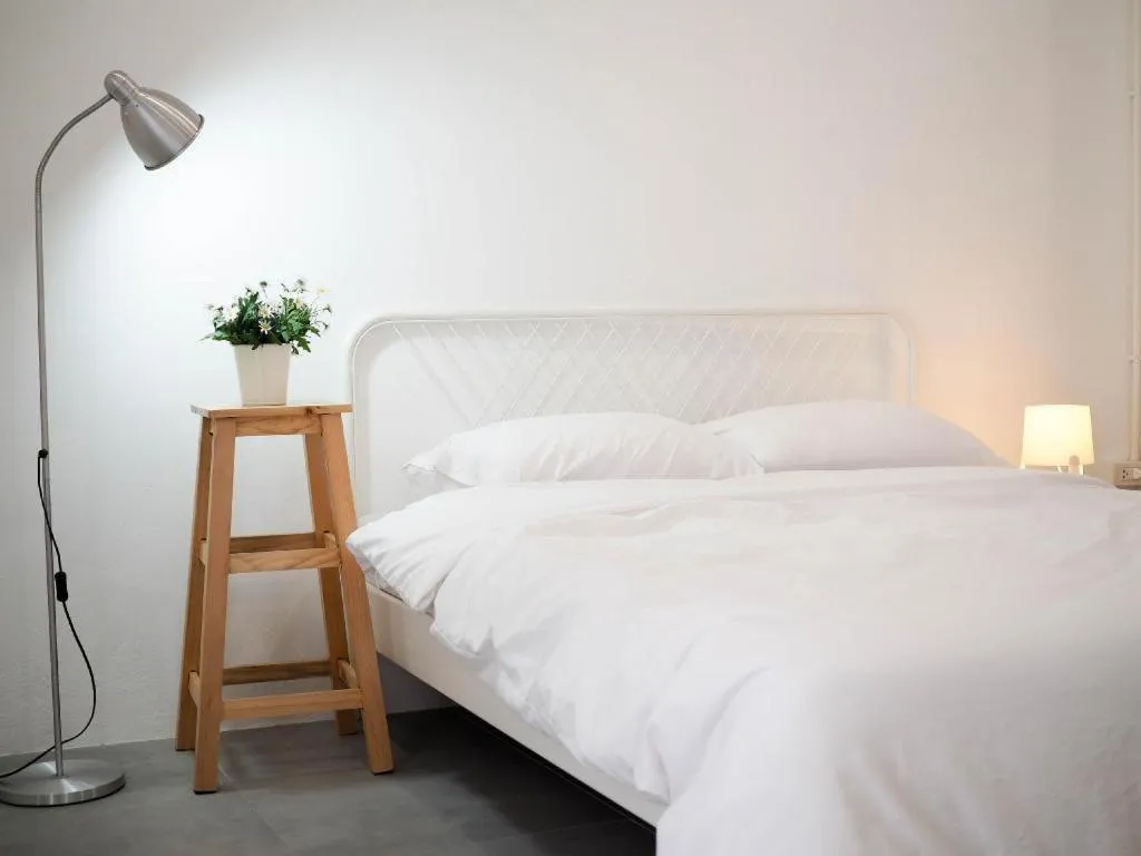 Bed in Unyak Room Ayutthaya