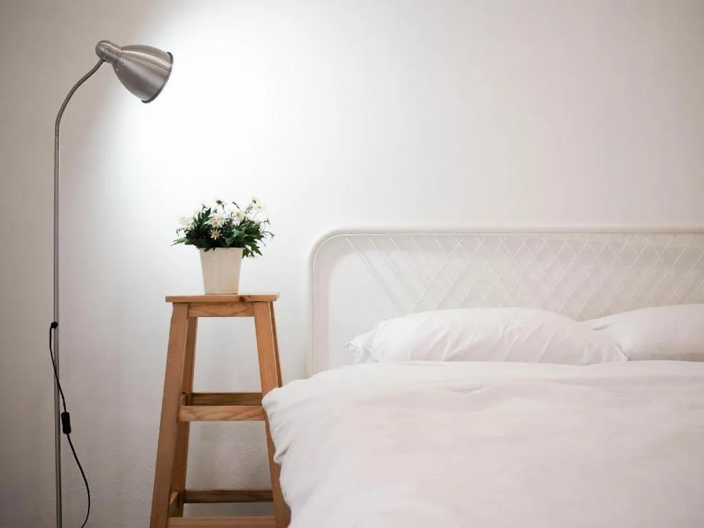 Bed in Unyak Room Ayutthaya