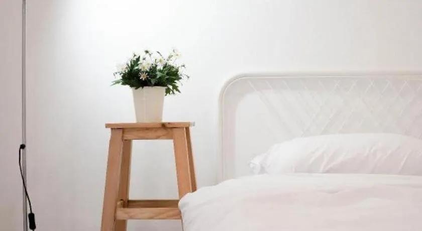 Bed in Unyak Room Ayutthaya