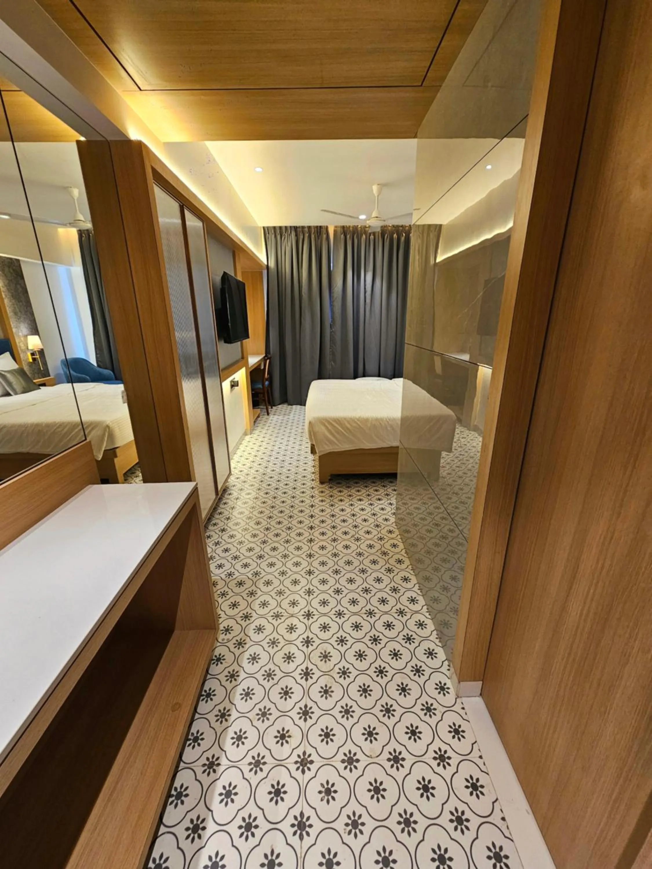 wardrobe, Bed in Hotel Golden Nest Thane