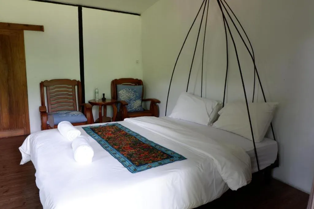 Bed in Le Bassin Erawan Resort