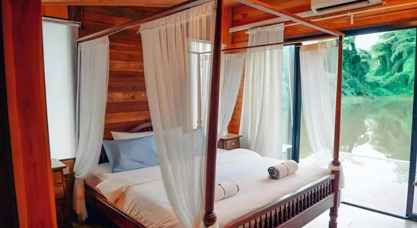 Bed in Le Bassin Erawan Resort