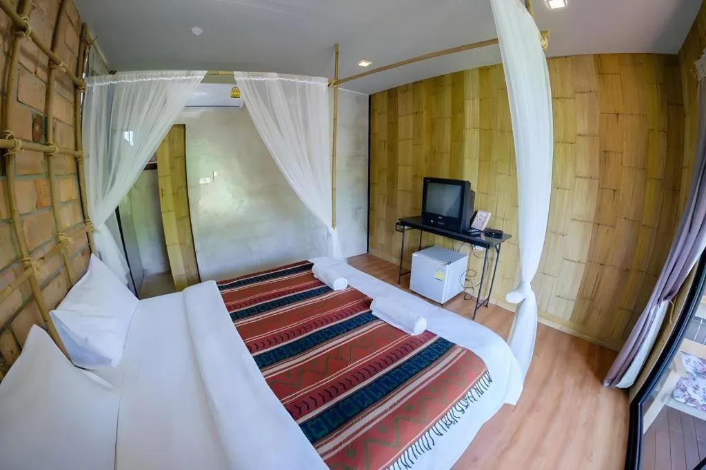 Bed in Le Bassin Erawan Resort