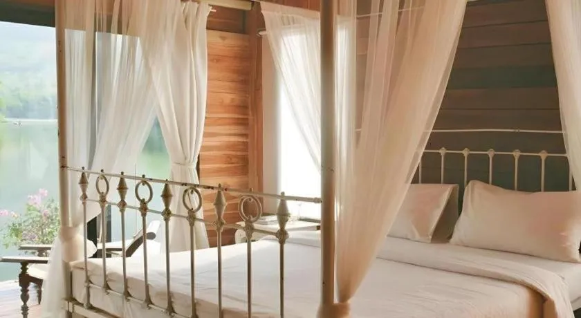 Bed in Le Bassin Erawan Resort