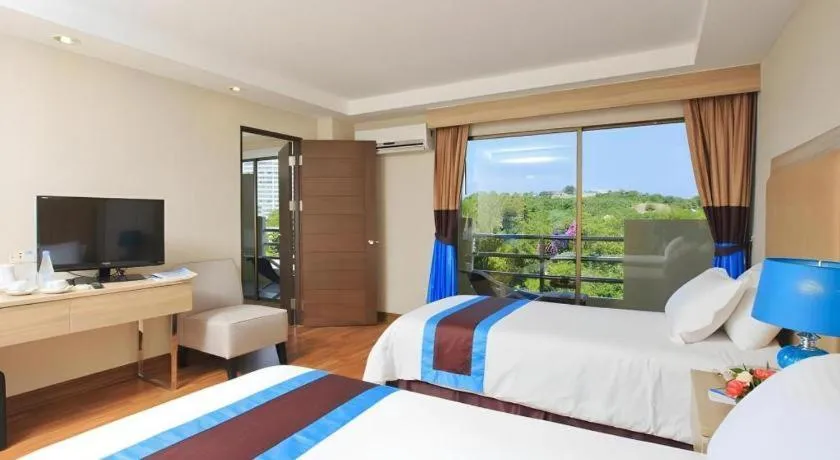 Bed in Blue Wave Hotel Hua Hin