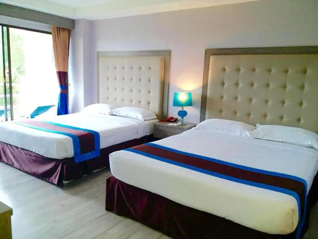 Bed in Blue Wave Hotel Hua Hin