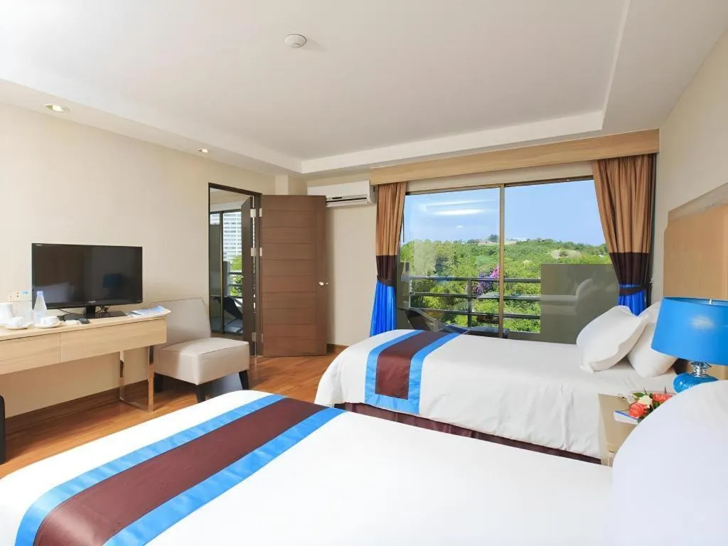 Bed in Blue Wave Hotel Hua Hin
