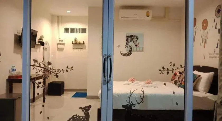 Bed in Baan Bhuriwat Kiriwong Bed in Baan Bhuriwat Kiriwong