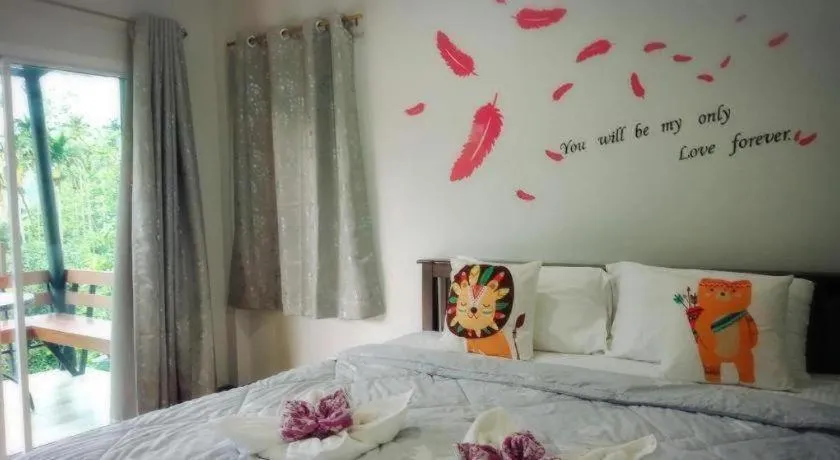 Bed in Baan Bhuriwat Kiriwong