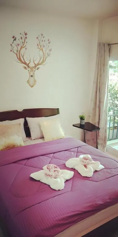 Bed in Baan Bhuriwat Kiriwong