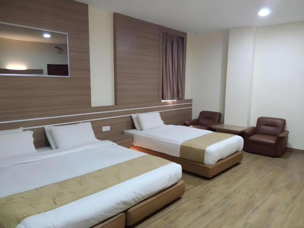 Bed in Holiday Hotel Batam