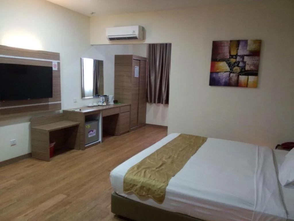 Bed in Holiday Hotel Batam
