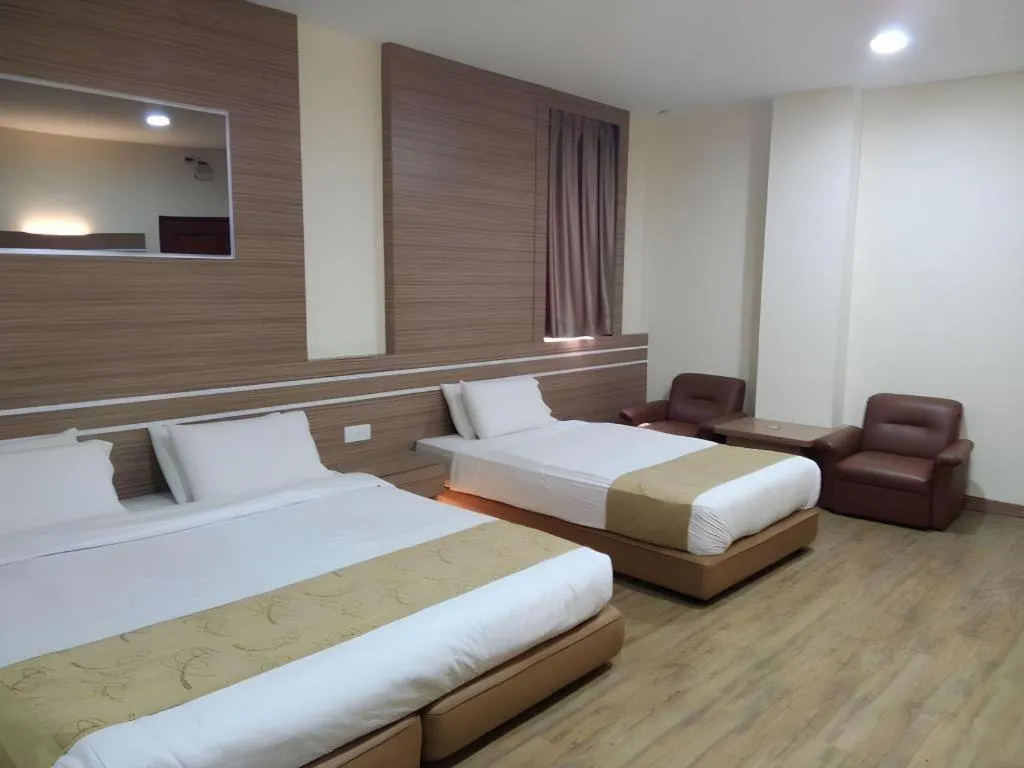 Bed in Holiday Hotel Batam