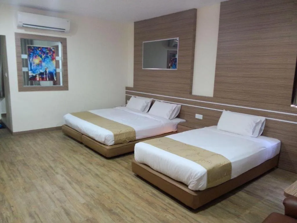 Bed in Holiday Hotel Batam