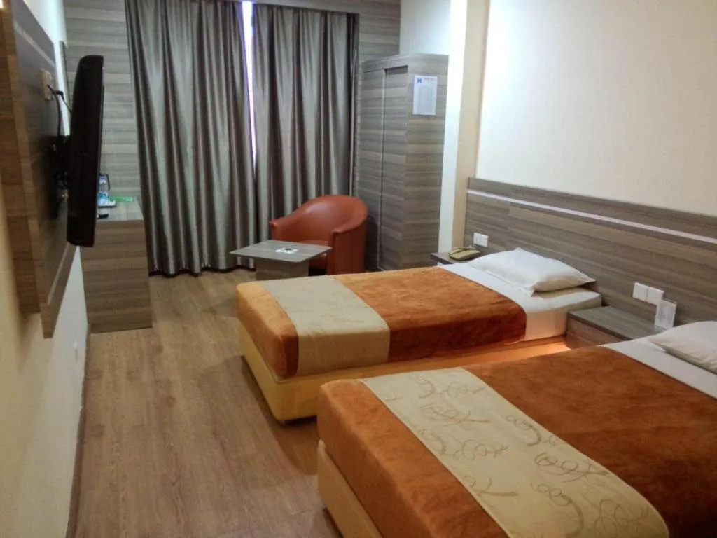 Bed in Holiday Hotel Batam