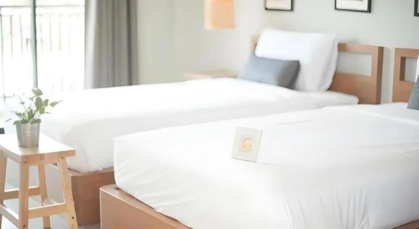 Bed in Yellow Moon Hotel