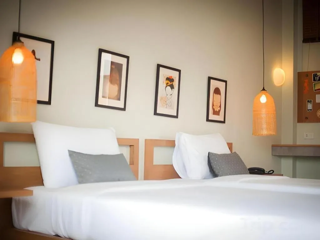 Bed in Yellow Moon Hotel