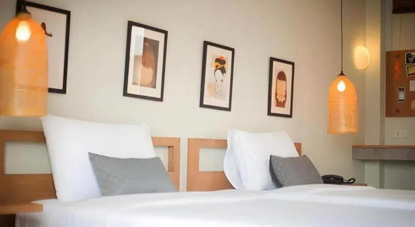 Bed in Yellow Moon Hotel