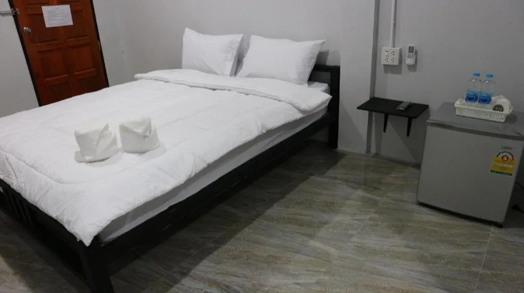 Bed in Narisara Korat Resort