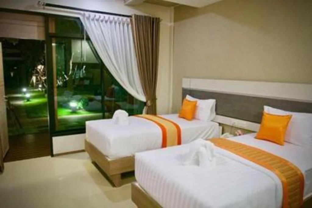 Bed in Chatnipa Beach Resort
