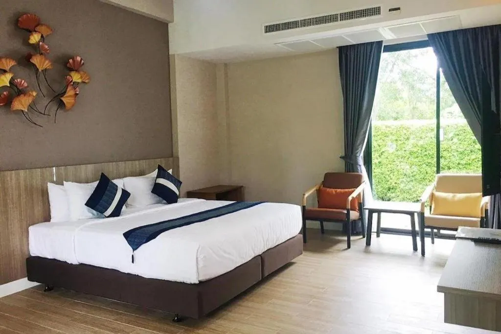 Bed in Chatnipa Beach Resort