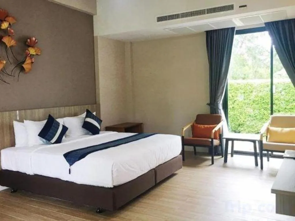 Bed in Chatnipa Beach Resort