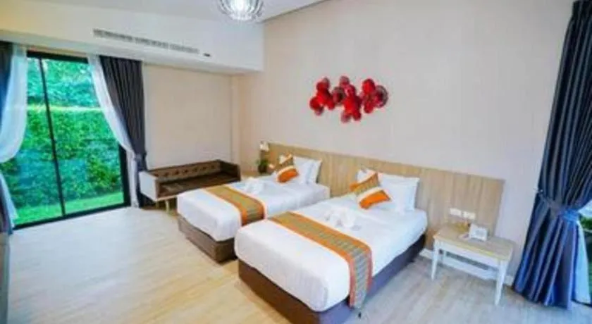 Bed in Chatnipa Beach Resort