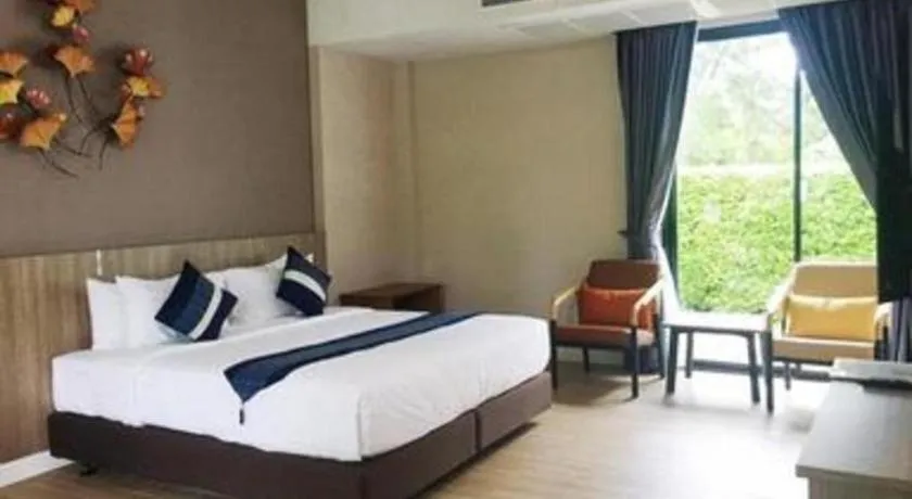 Bed in Chatnipa Beach Resort