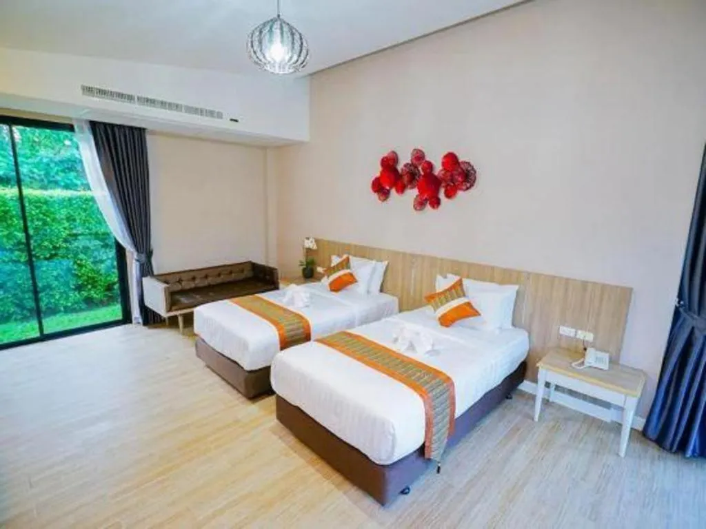Bed in Chatnipa Beach Resort