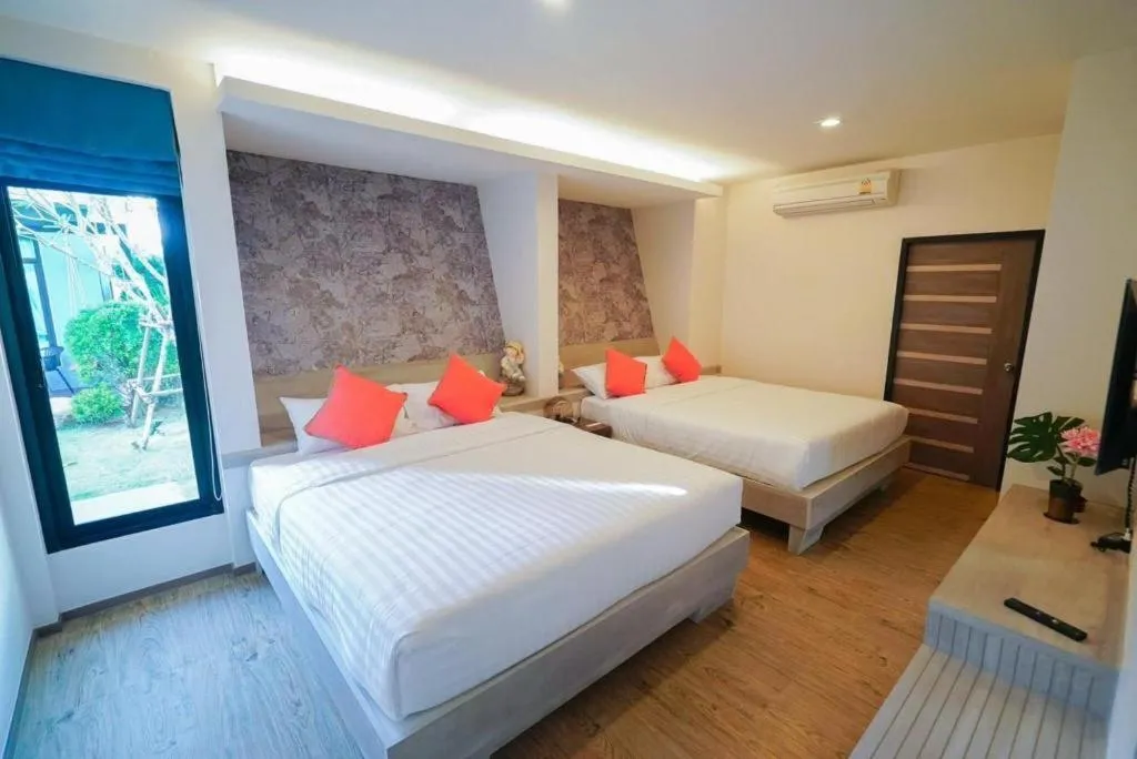 Bed in Chatnipa Beach Resort