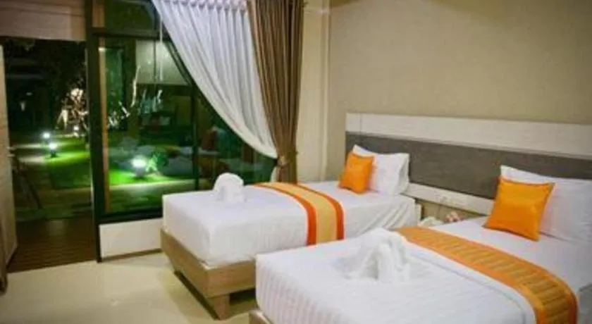 Bed in Chatnipa Beach Resort