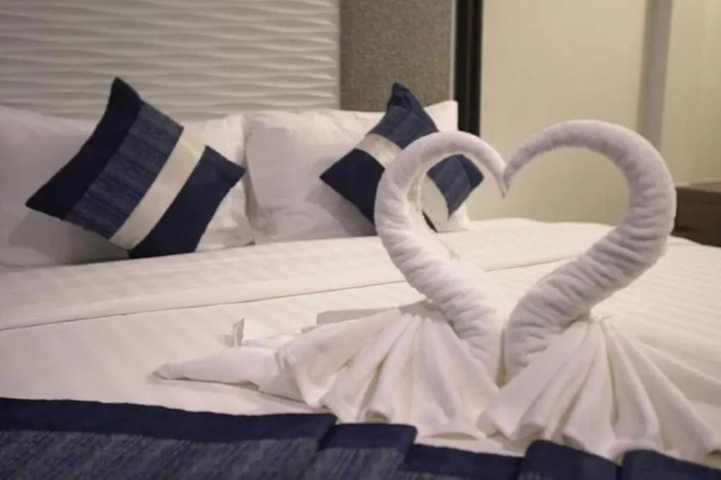 Bed in Chatnipa Beach Resort