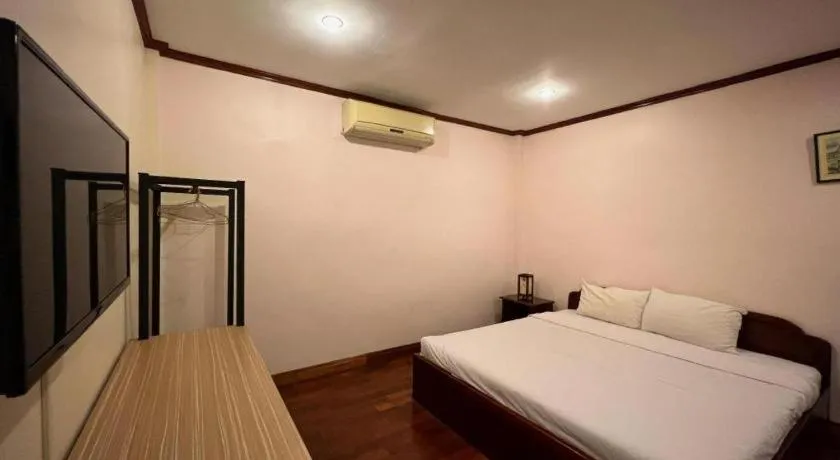 Bed in Souphaphone Hotel