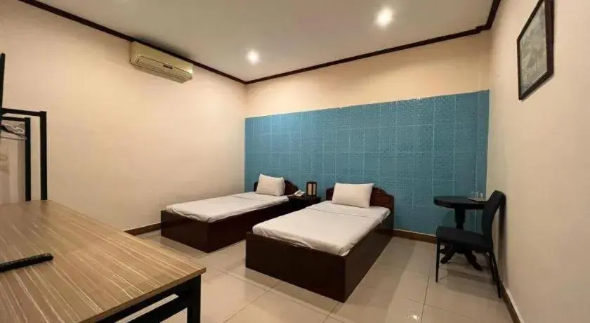 Bed in Souphaphone Hotel Bed in Souphaphone Hotel