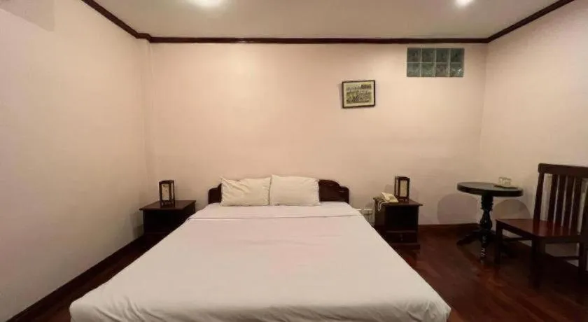 Bed in Souphaphone Hotel
